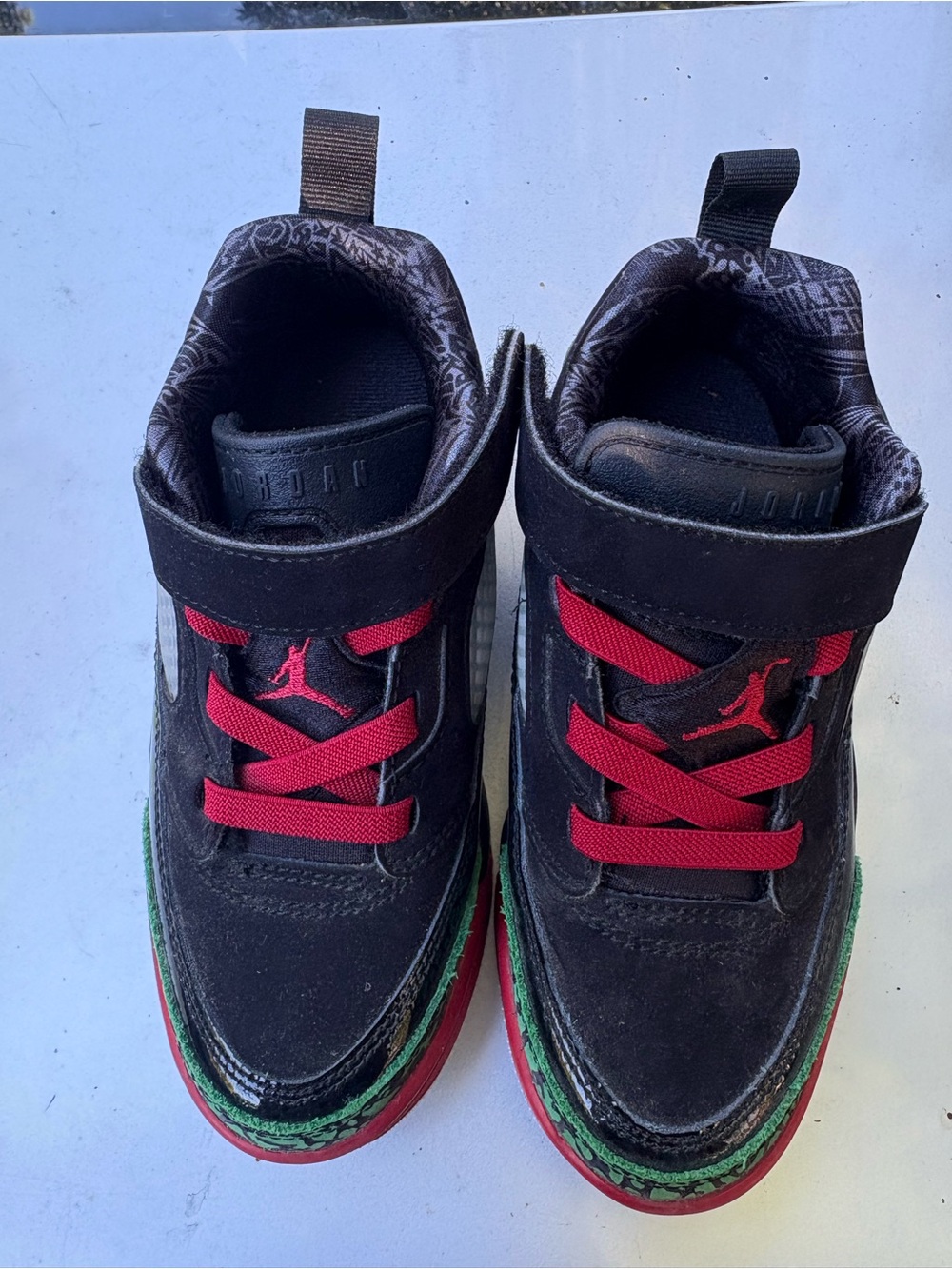 Jordan Kids Black Sneakers with Red Laces and Green Trim